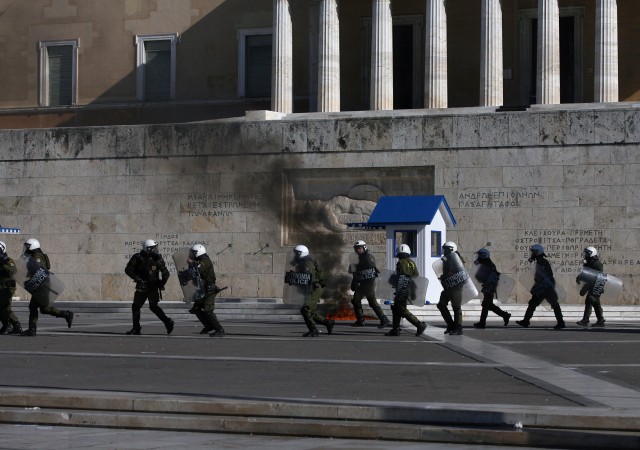 (151112) -- ATHENS, Nov. 12, 2015 (Xinhua) -- Greek riot police clash with protesters in central Athens, Greece, Nov. 12, 2015. Greece was hit on Thursday by a 24-hour nationwide general strike called by trade unions protesting the new round of austerity measures imposed to redress a six-year debt crisis. (Xinhua/Marios Lolos) - Infophoto